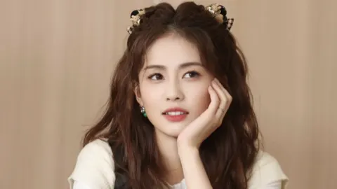 梁实第30次参加高考